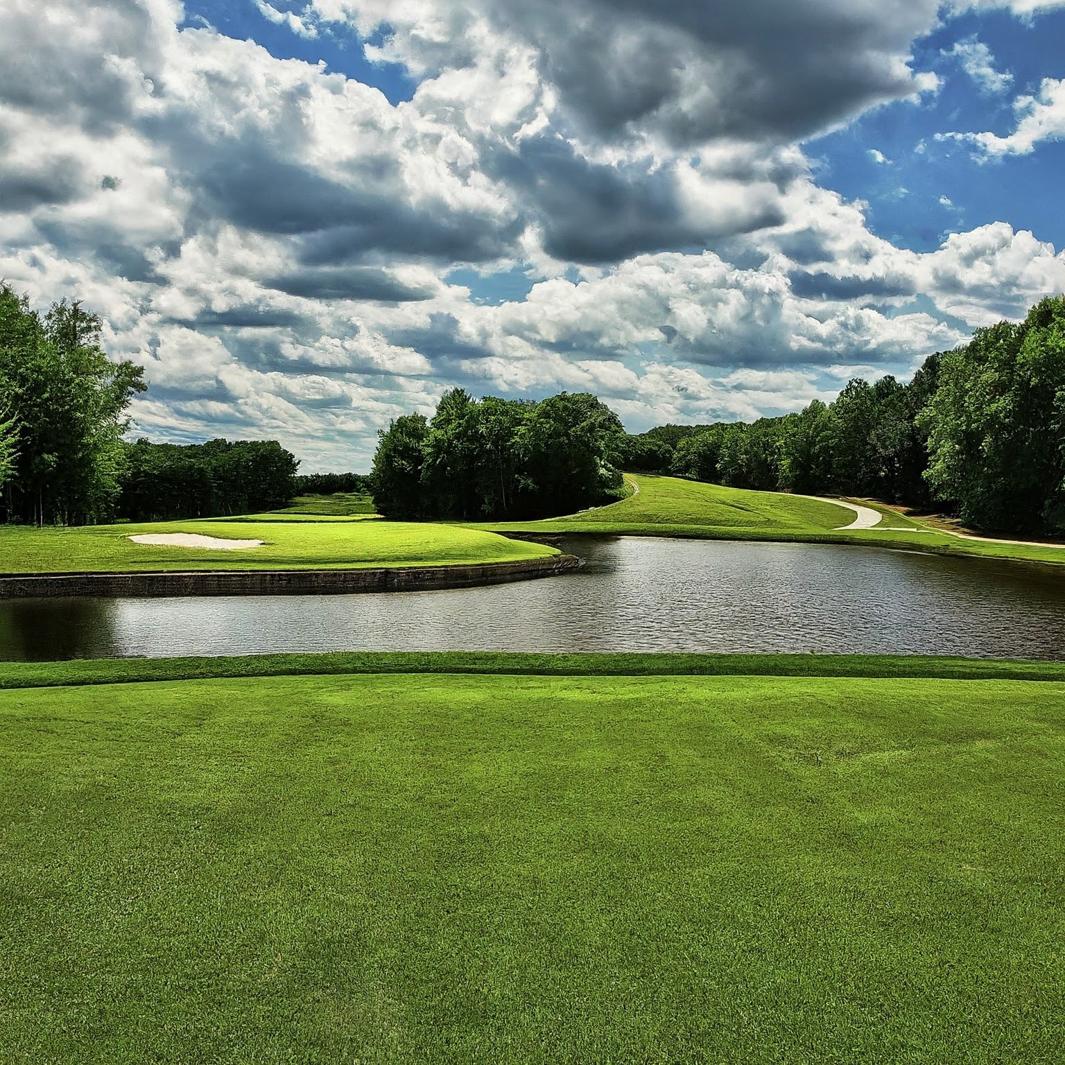 View at Hole 16, a Par 4 overlooking small pond